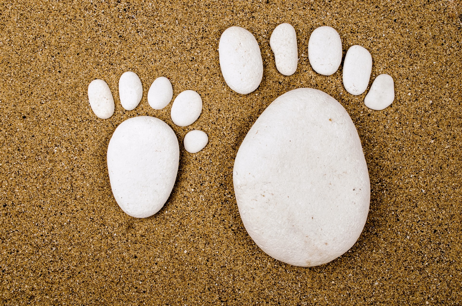 Wallpapers white stones sand footprints on the desktop