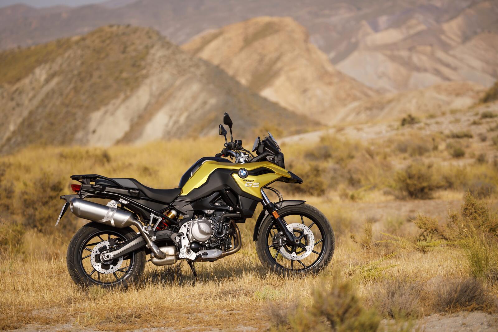 Free photo Bmw f750gs in a field of tall grass