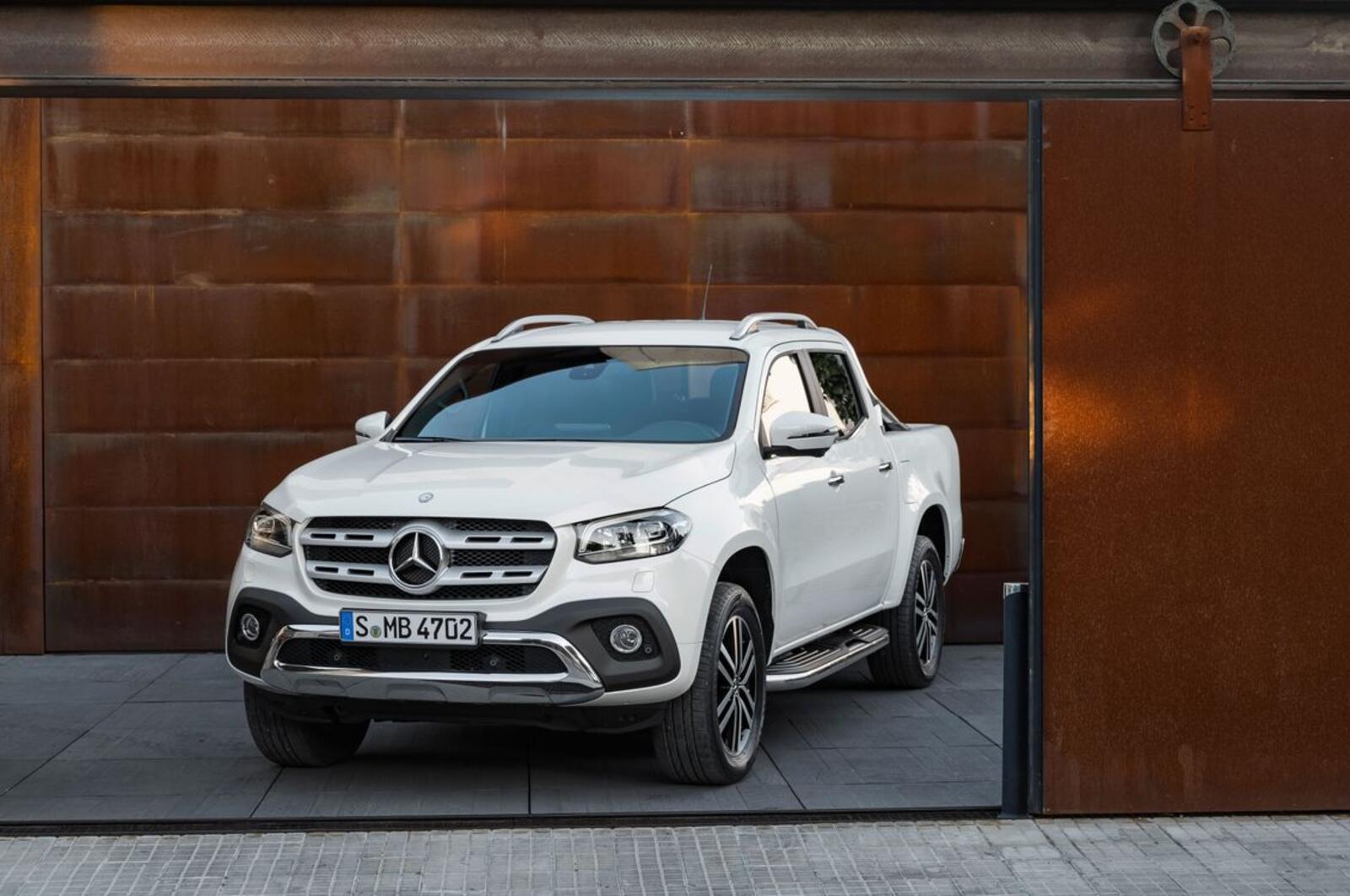 Wallpapers Mercedes-Benz X-class white pick-up truck rides leaves on the desktop