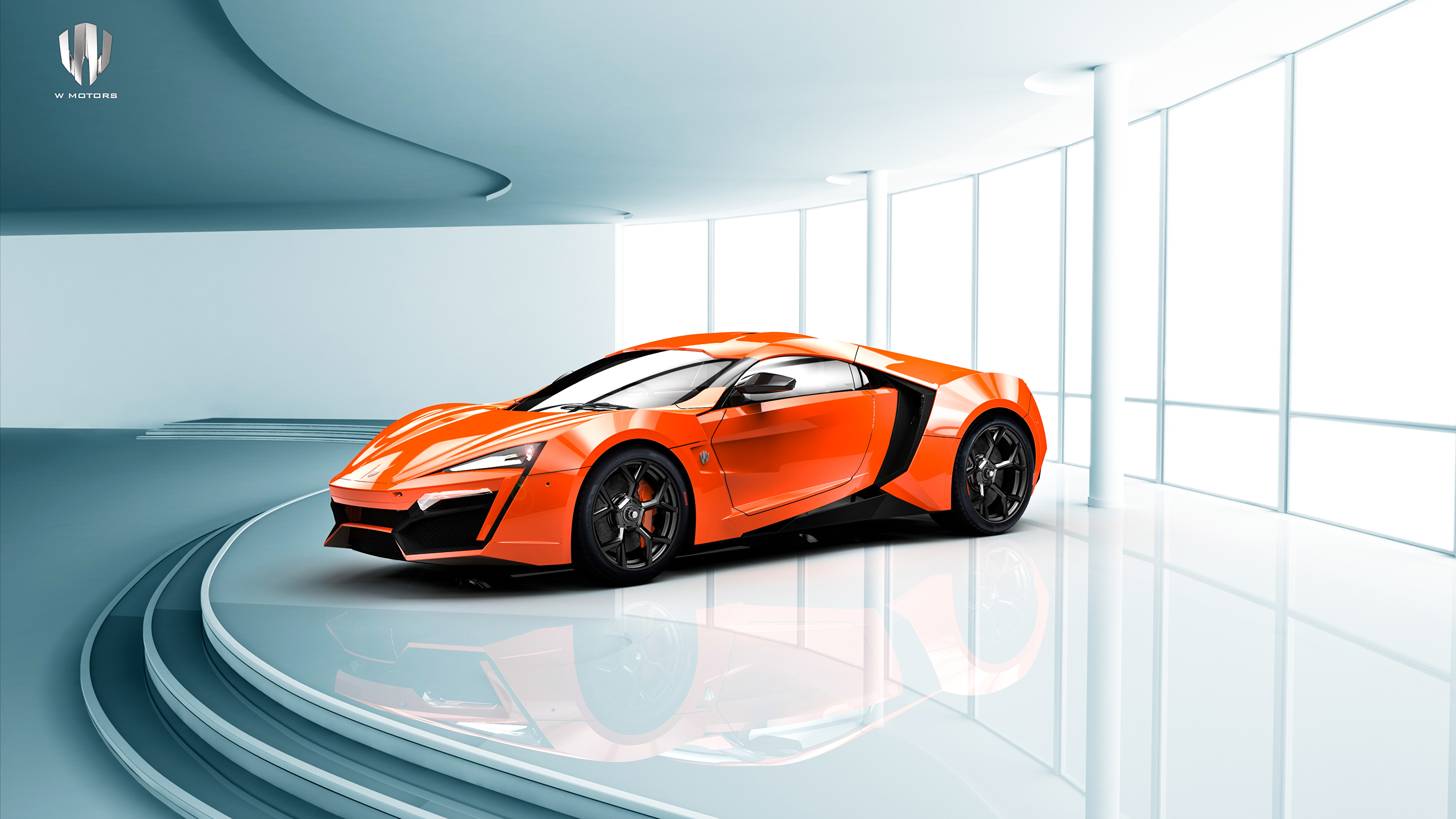 桌面上的壁纸莱卡超级运动模型车 橙色汽车 侧视图