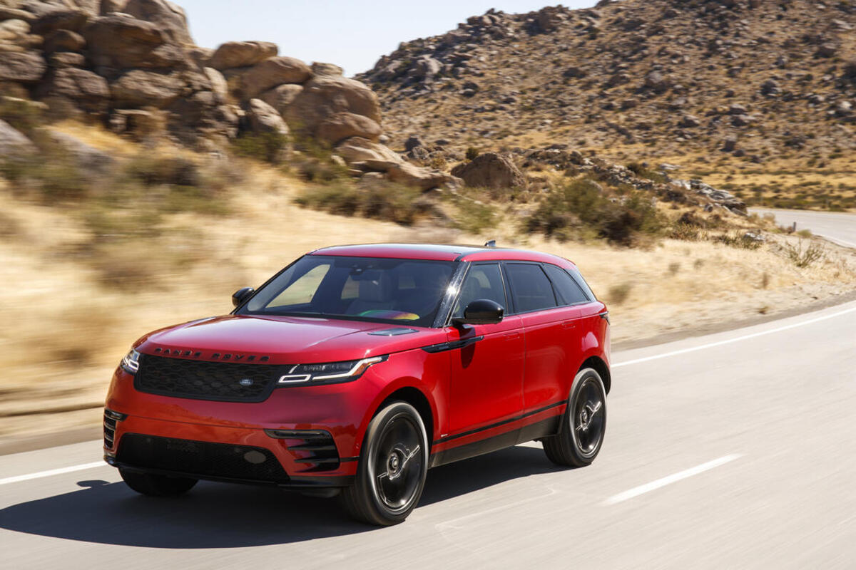 A red Range Rover Velar on the move