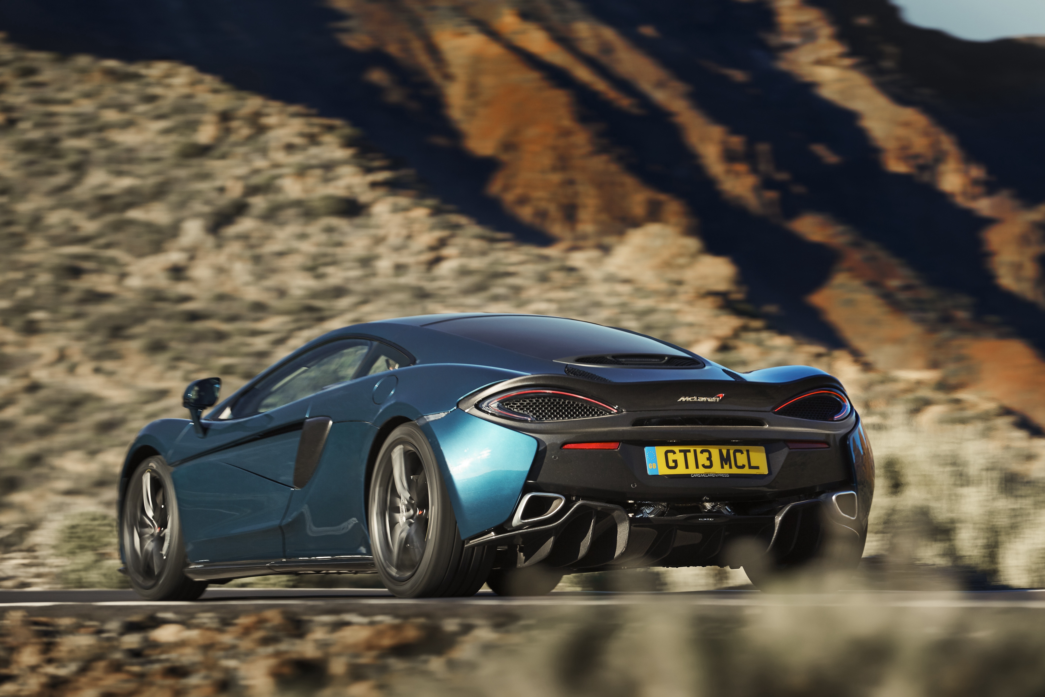 Wallpapers wallpaper mclaren 570gt view from behind black and blue on the desktop