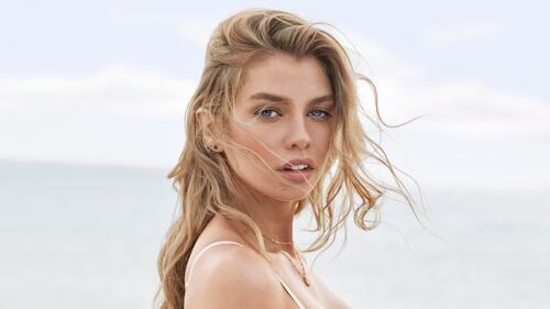Stella Maxwell poses in windy conditions