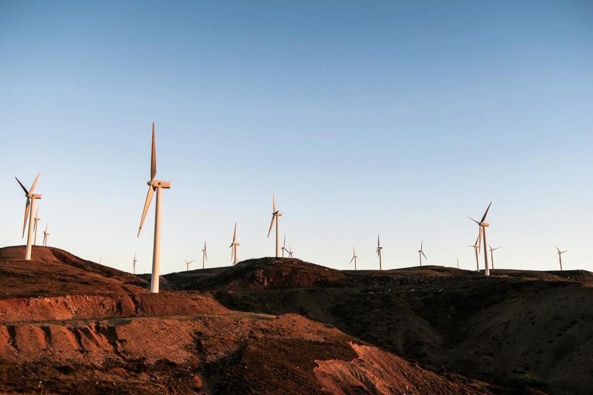 Windmills on rocky terrain