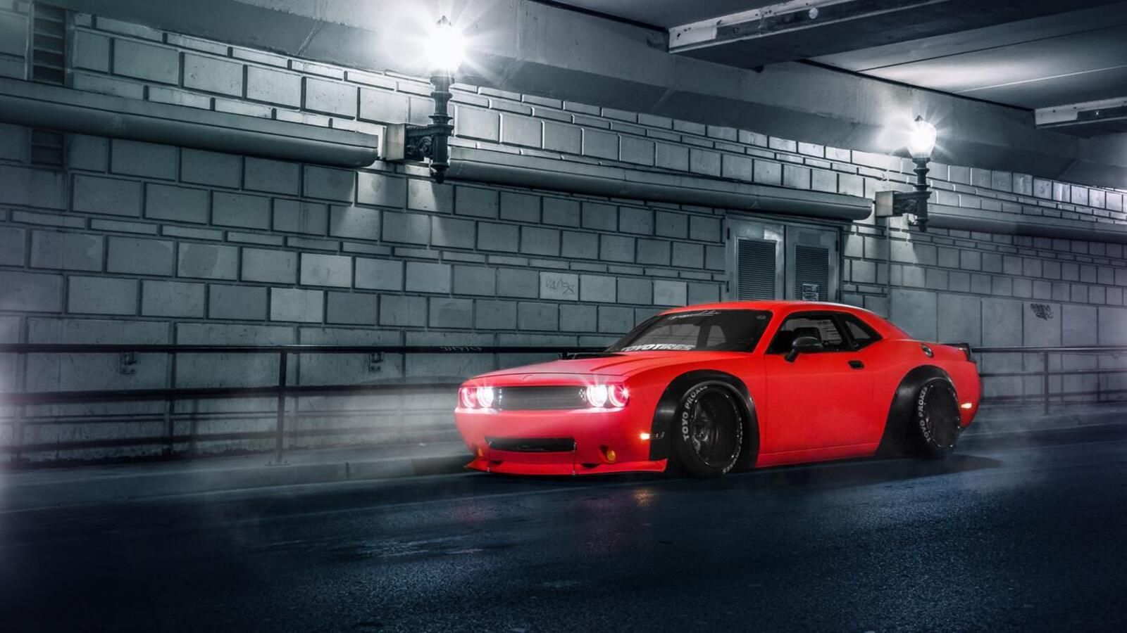 Free photo Wallpaper with a red dodge challenger srt in the tunnel