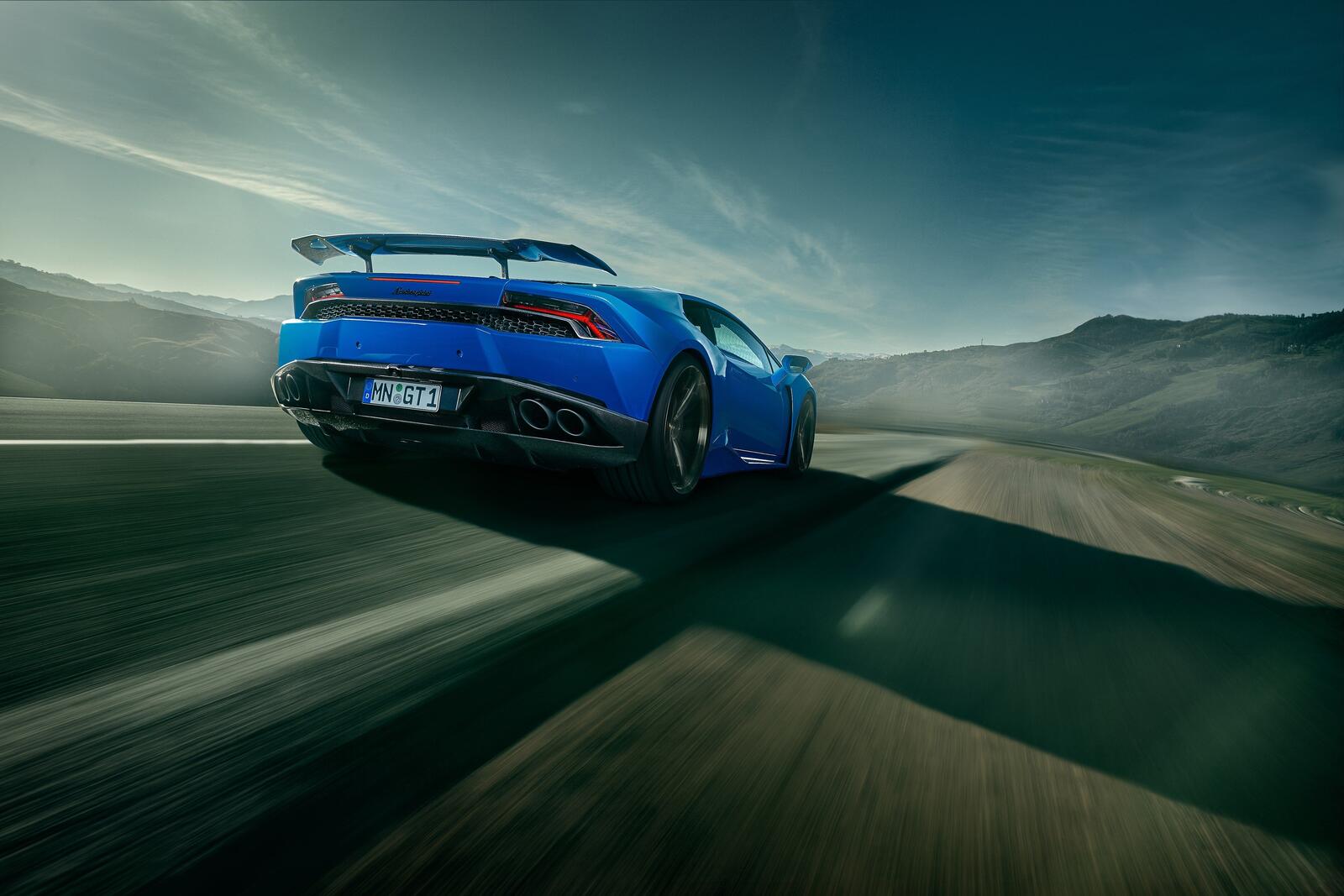 Wallpapers Lamborghini Huracan in move blue car on the desktop