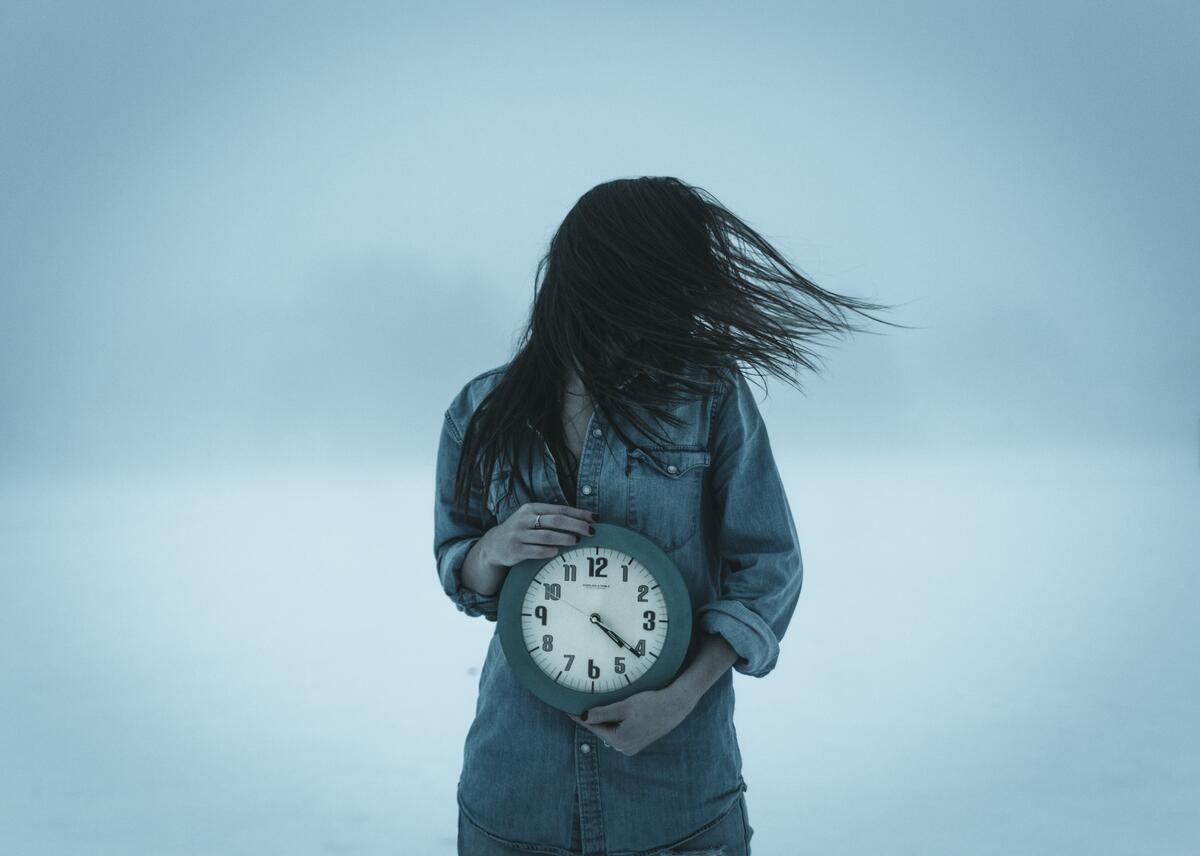 The girl with a clock