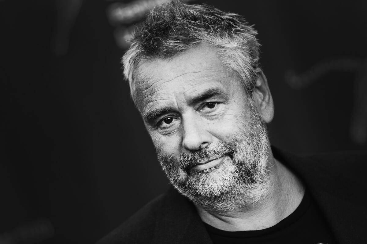 Luc Besson in a monochrome photo