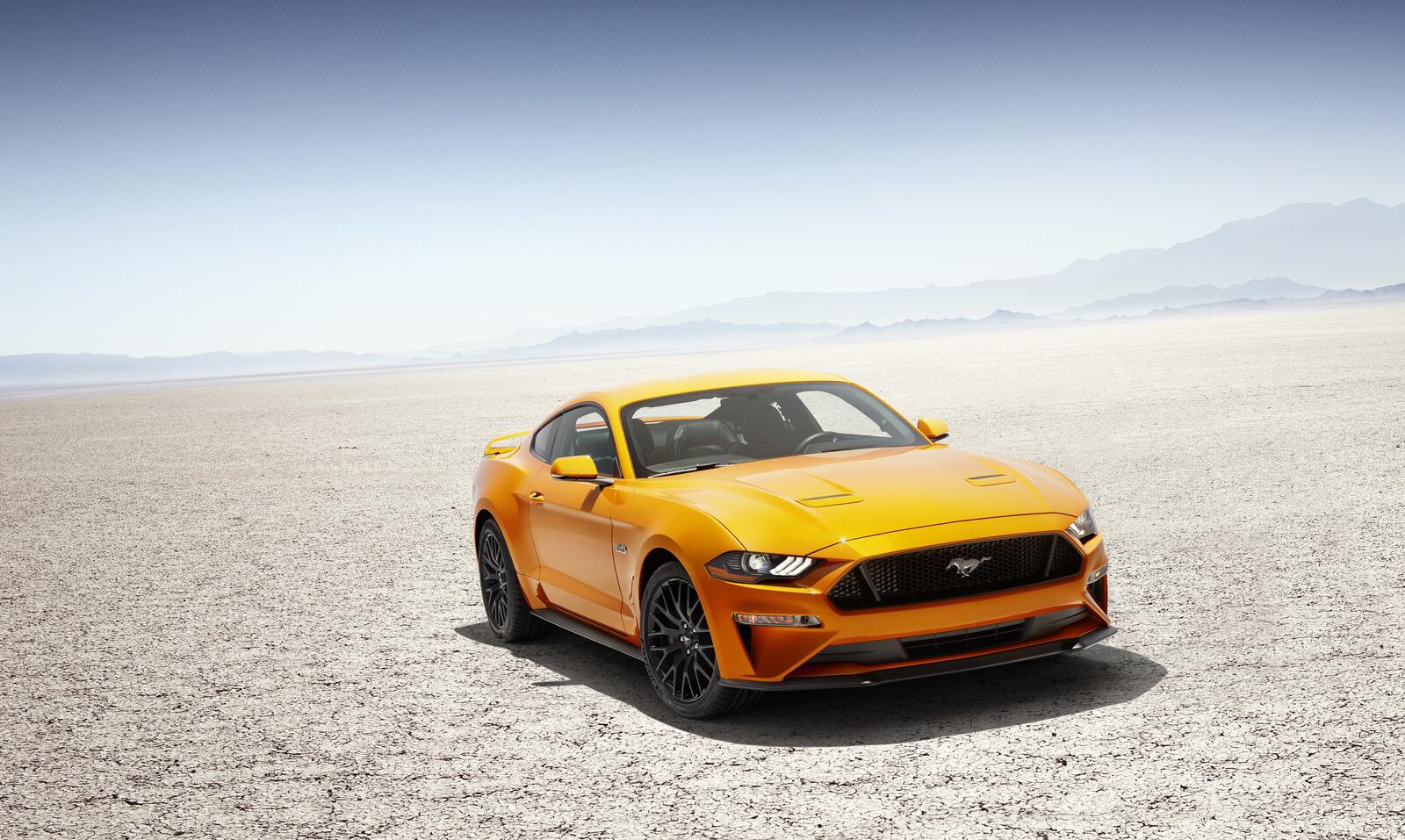 Free photo Beach-yellow Ford Mustang.
