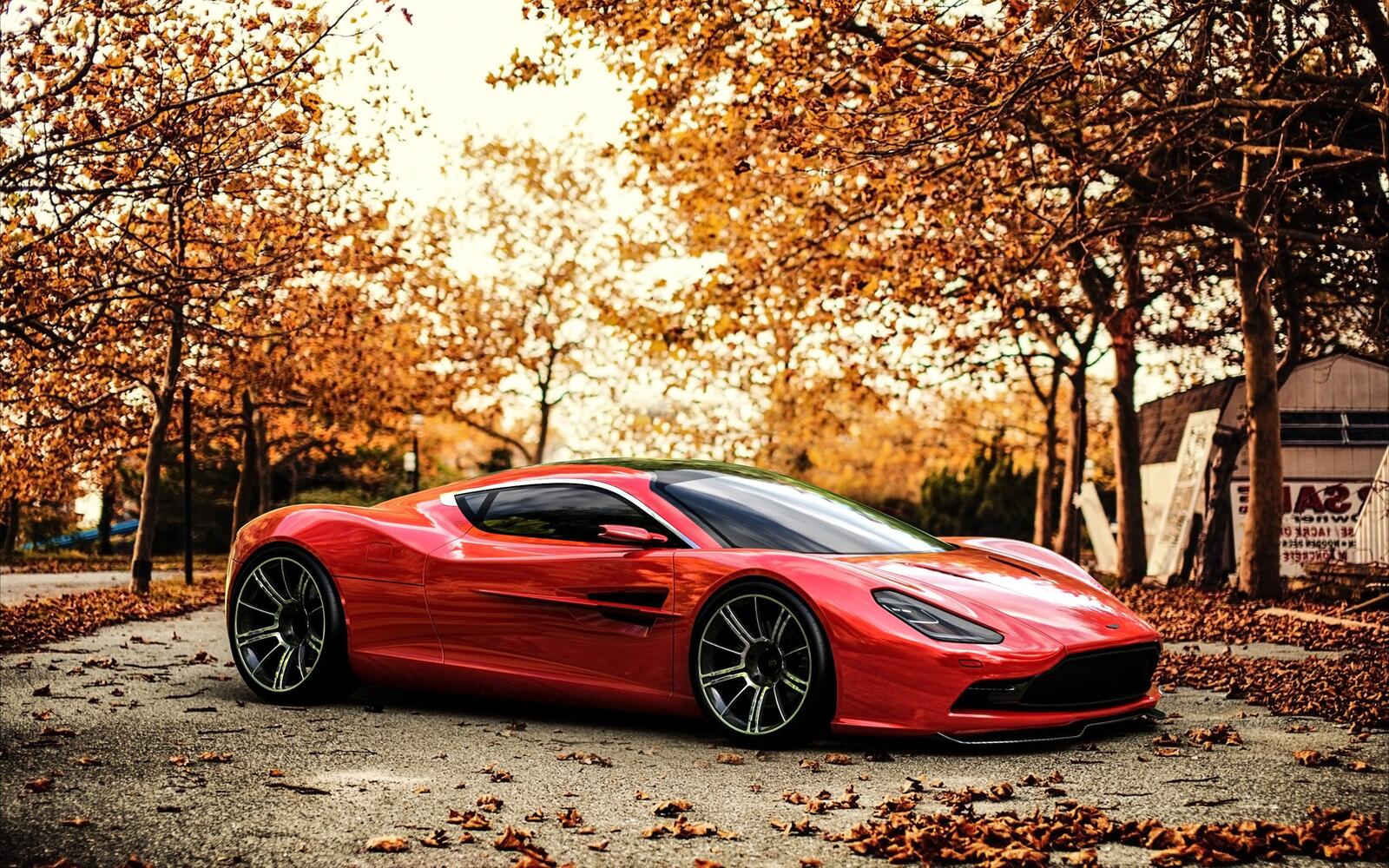 Бесплатное фото Крутой Aston Martin красного цвета