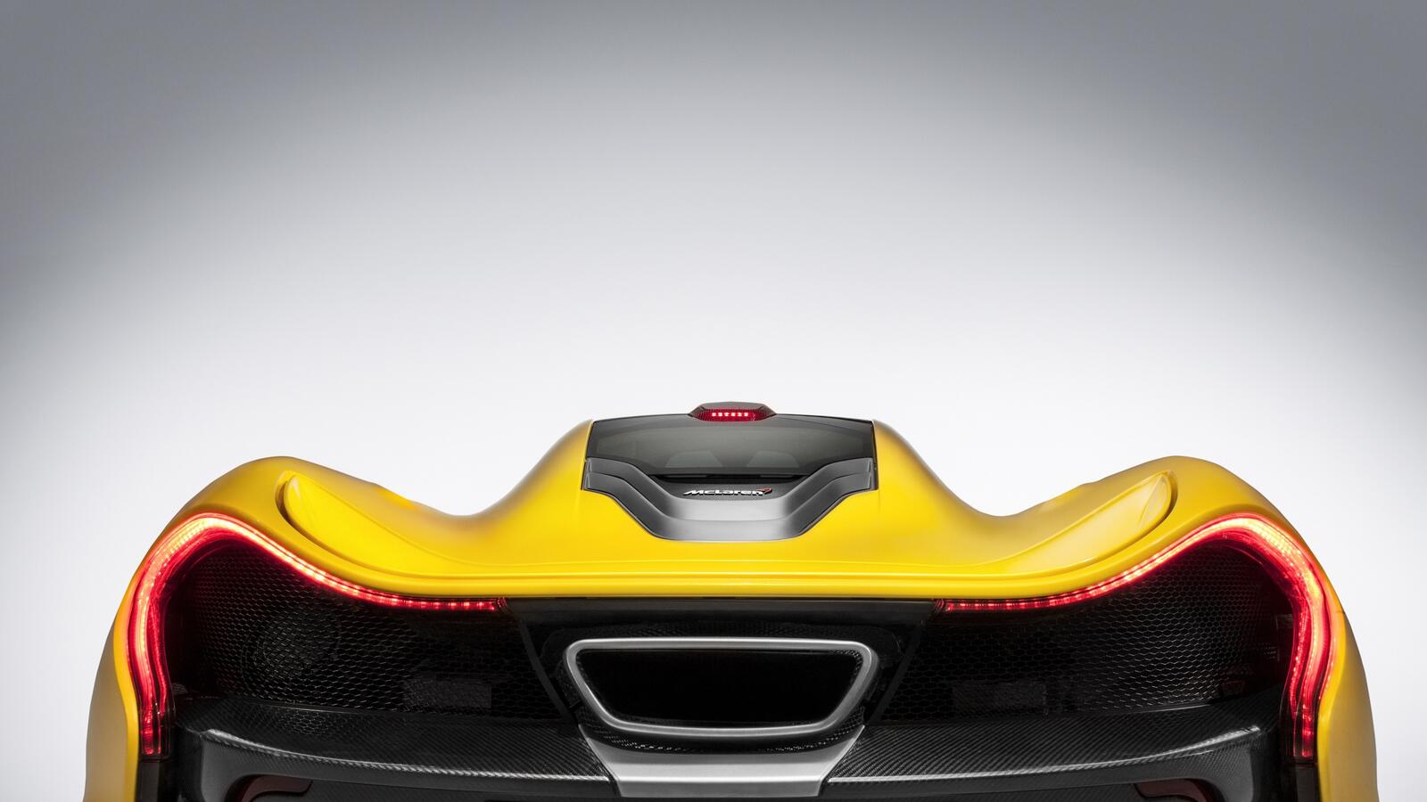 Wallpapers view from behind yellow supercar on the desktop