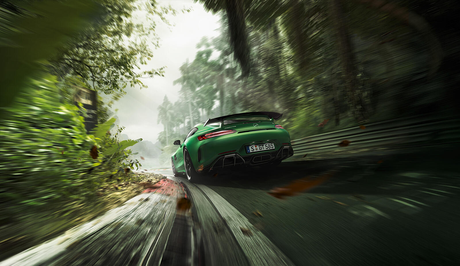 Free photo Mercedes AMG GTR driving on a forest country road