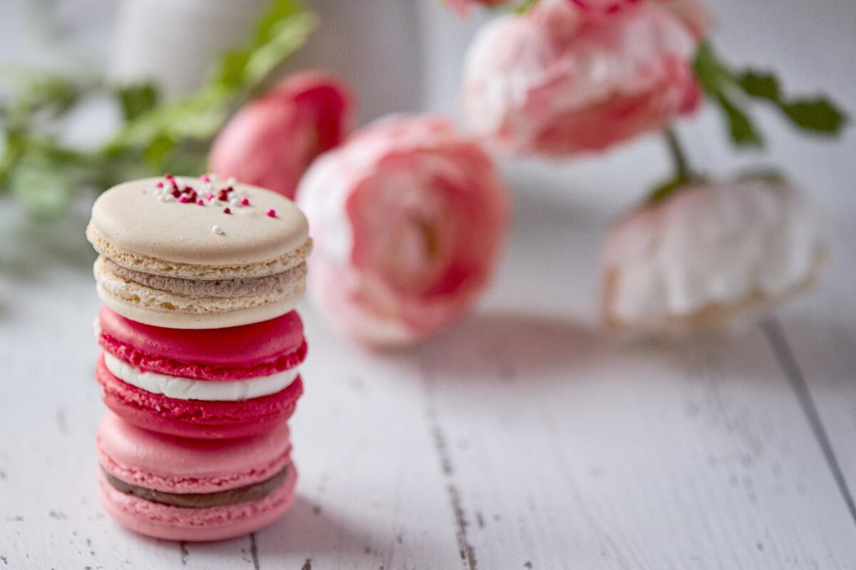 Colorful macarons on a wooden background