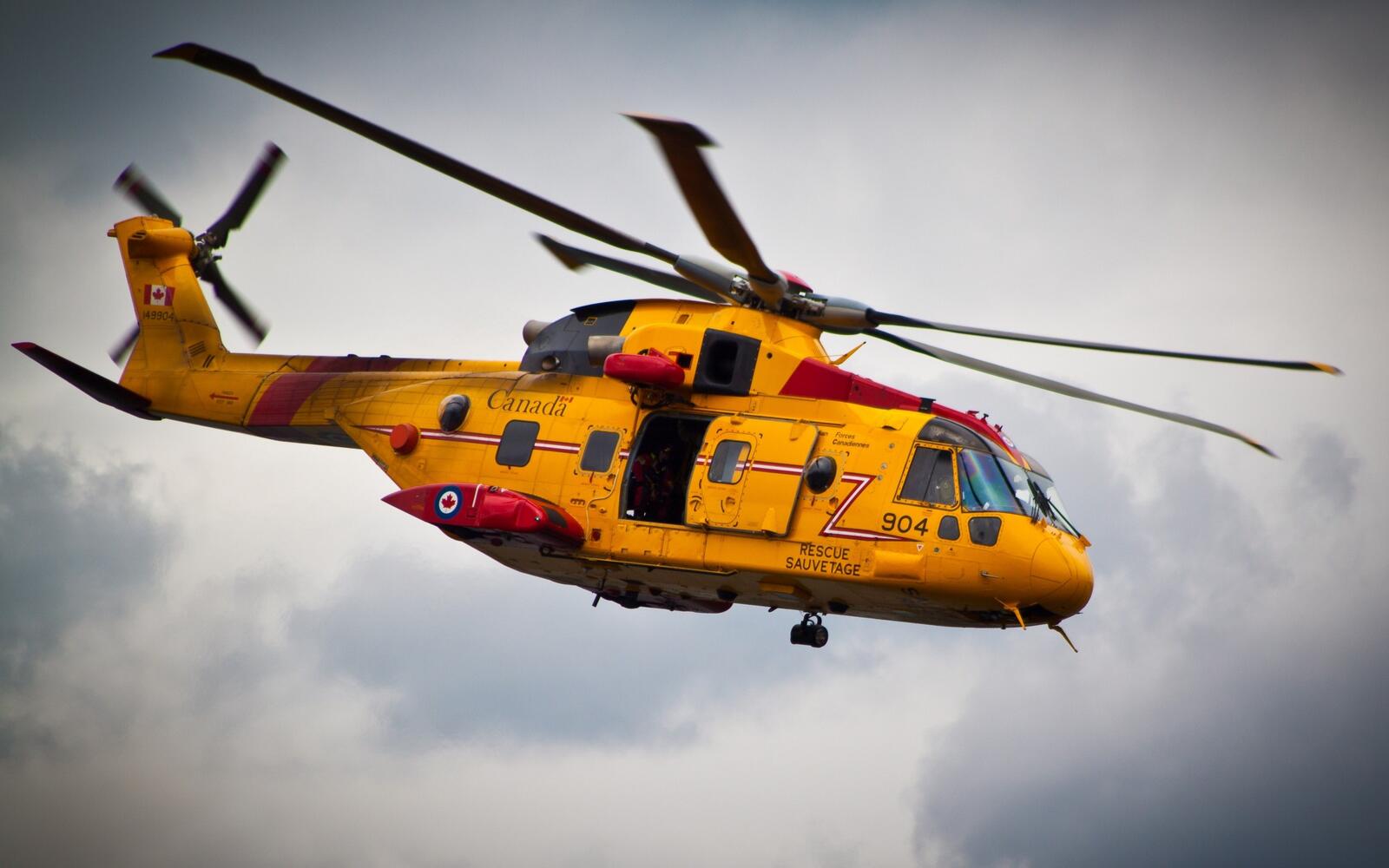 Бесплатное фото Желтый вертолет Sikorsky sh 3 sea king