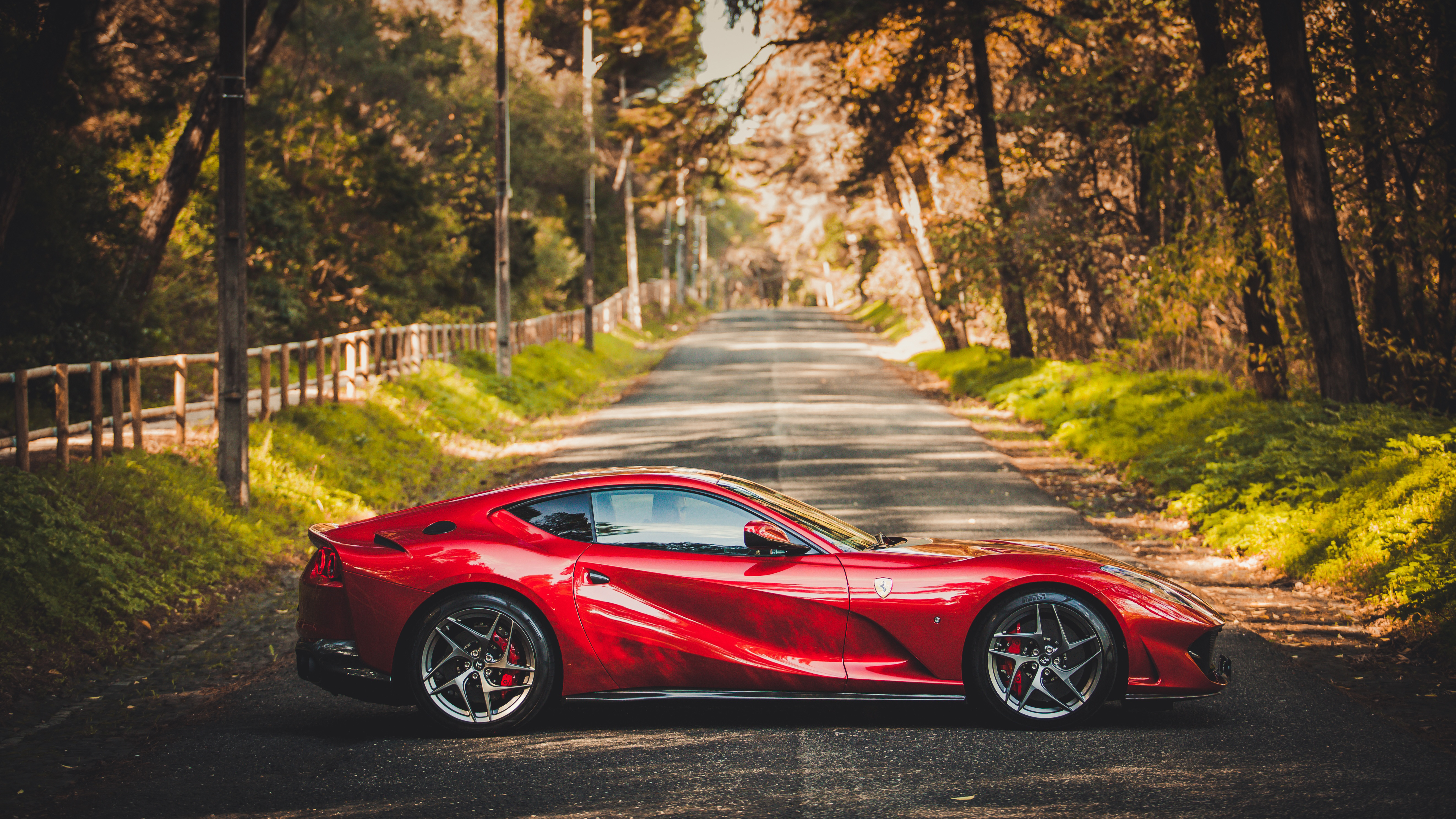 Wallpapers Ferrari 812 red forest road on the desktop
