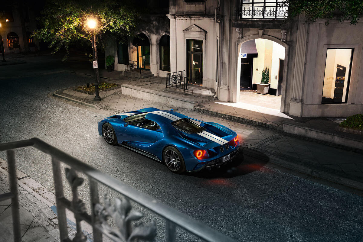 Blue Ford GT with white stripes on the roof