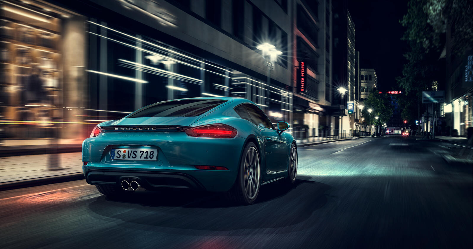 Wallpapers Porsche Cayman view from behind in move on the desktop