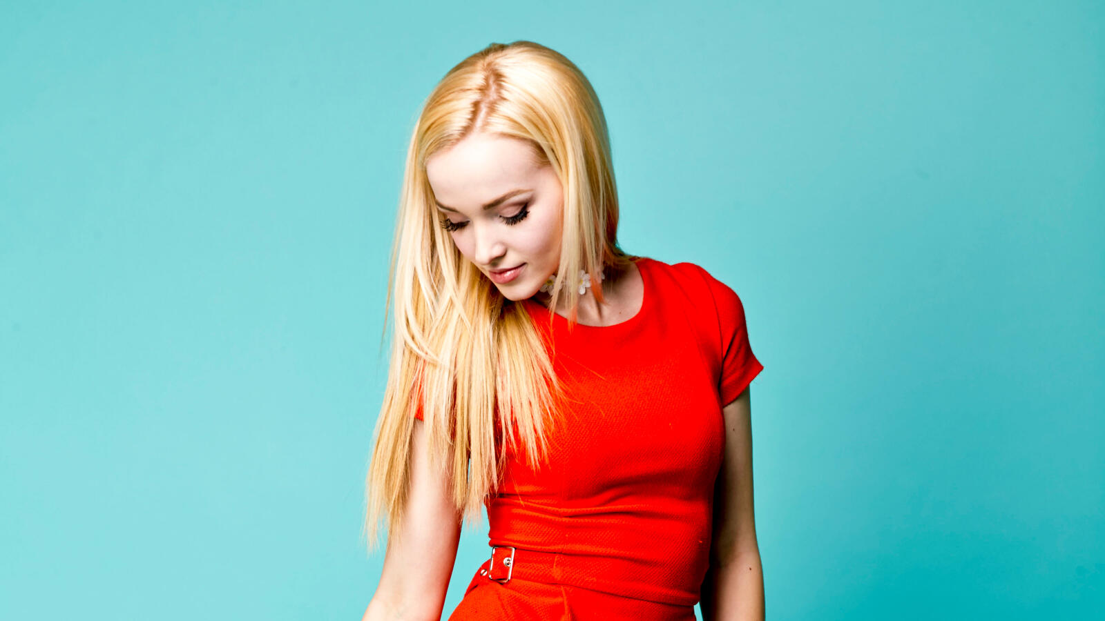 Free photo Dove Cameron in a red dress