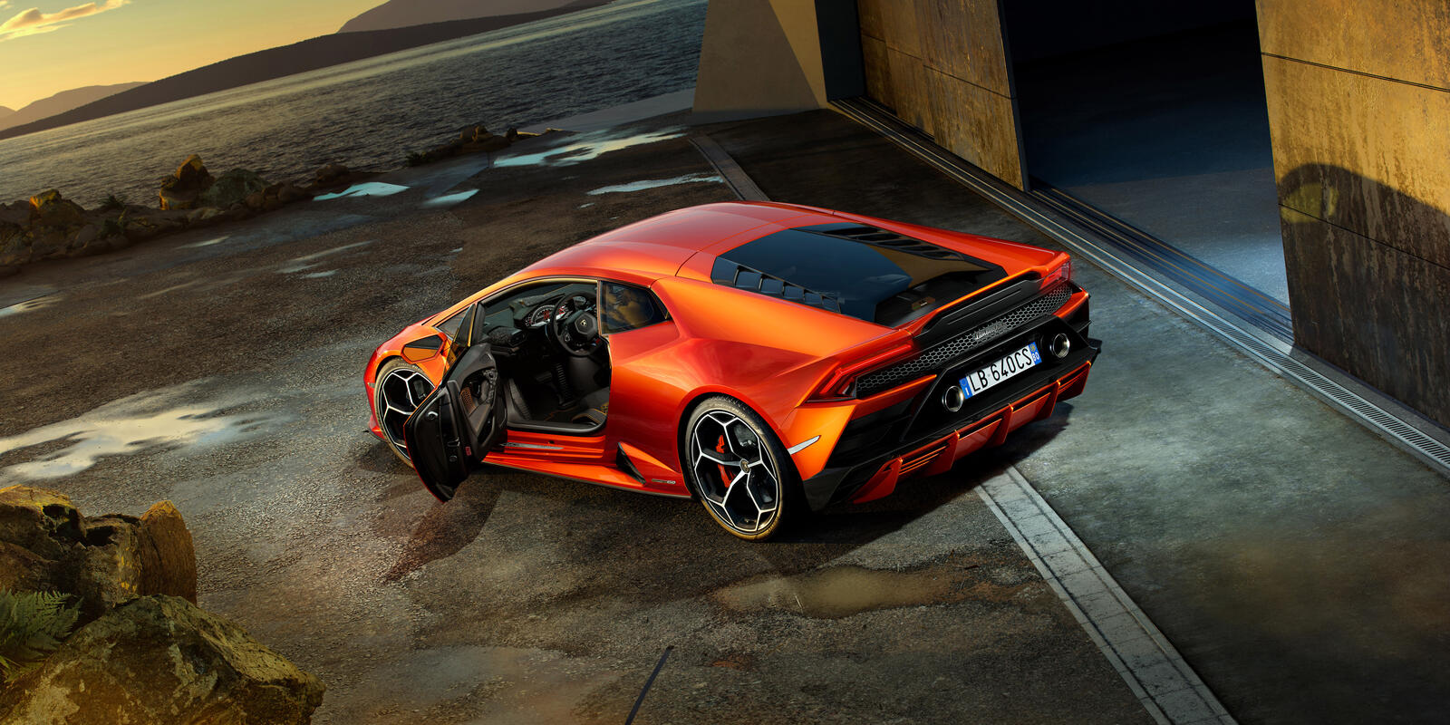 Wallpapers Lamborghini Huracan Evo orange car view from the top on the desktop