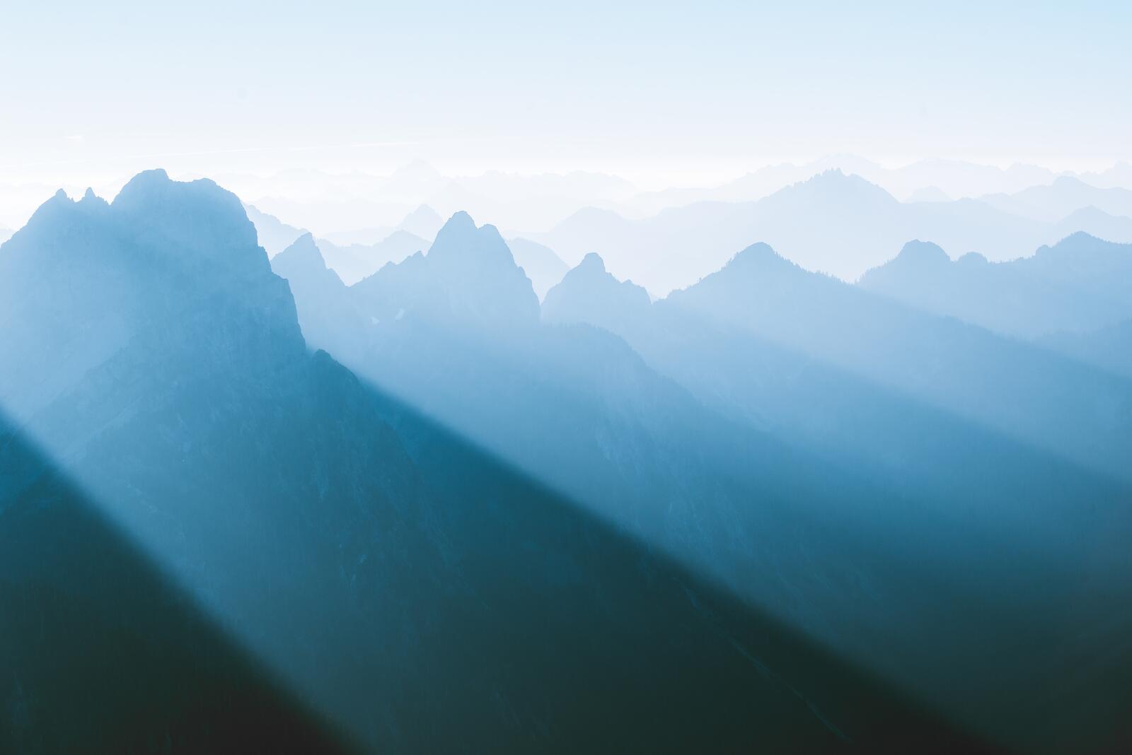 Wallpapers light cascade foggy mountains on the desktop