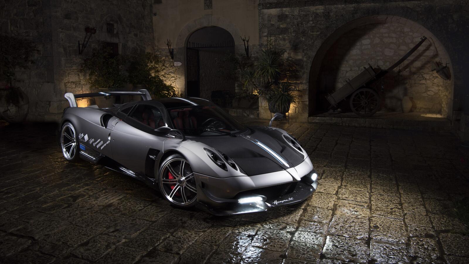 Free photo Pagani huayra in an ancient castle.