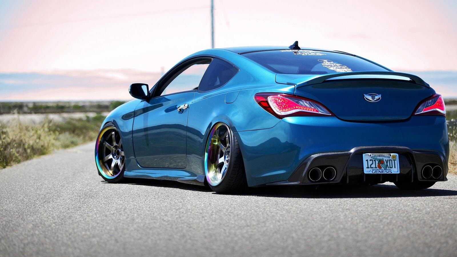 Free photo Blue hyundai genesis coupe on stance rear view