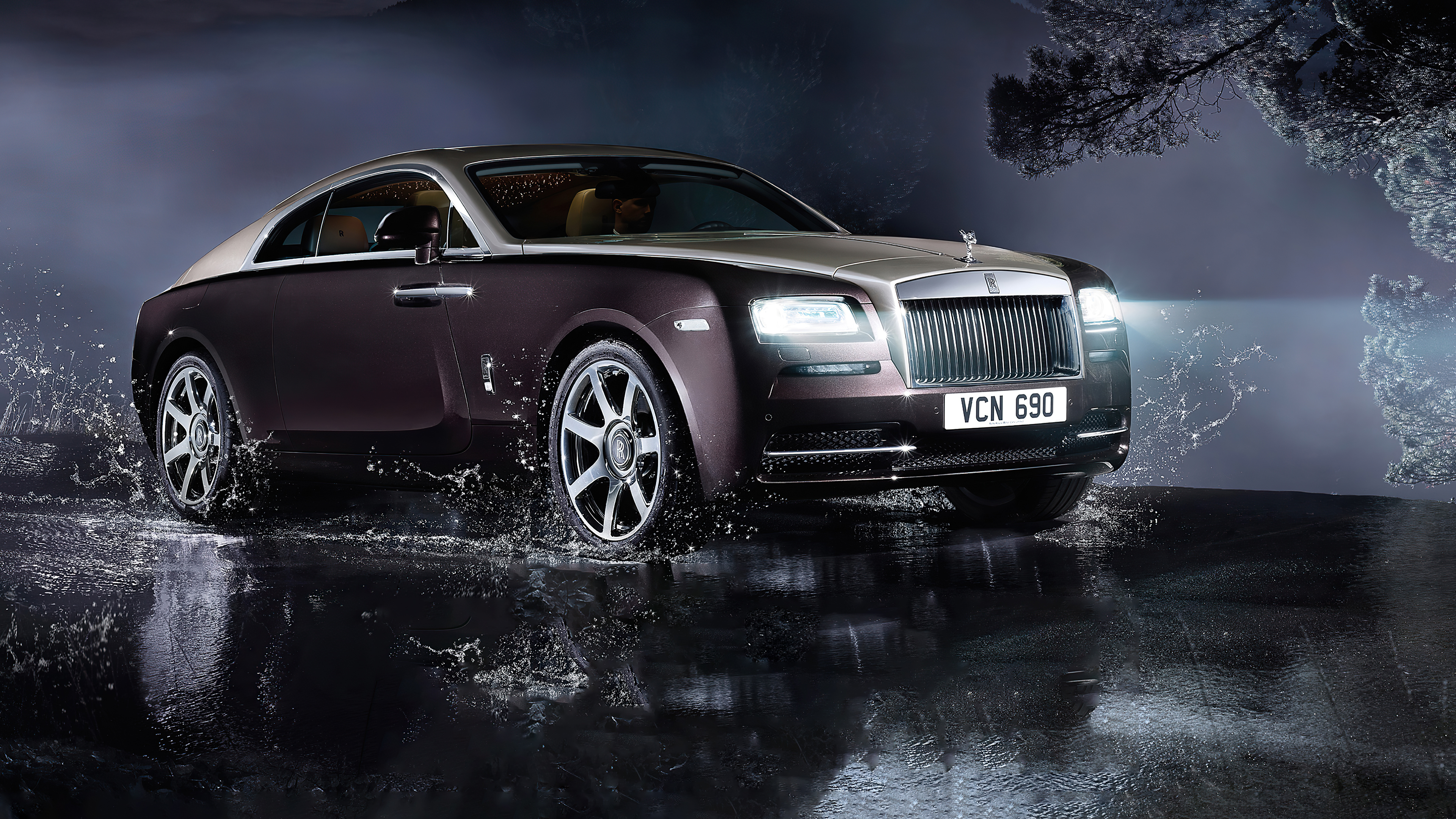 The Rolls Royce Wraith is driving on water.
