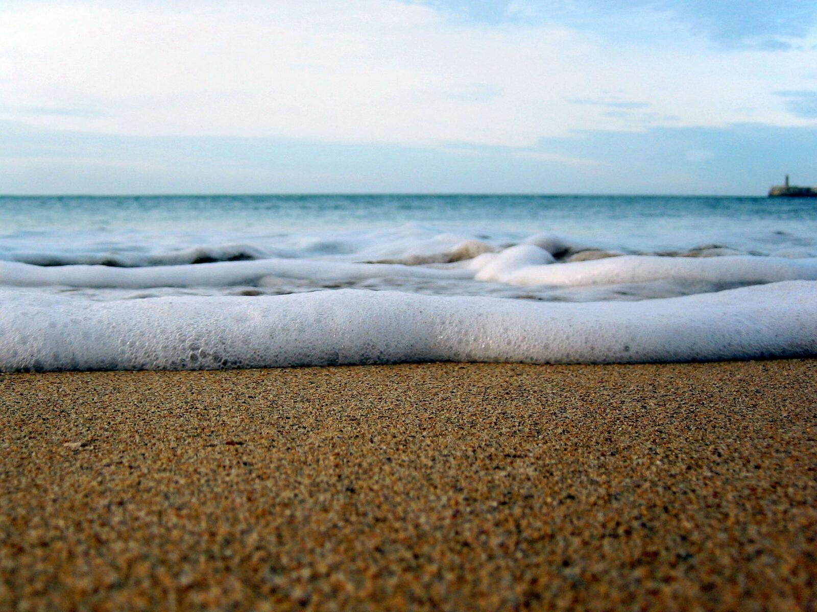 Бесплатное фото Морская пена на берегу