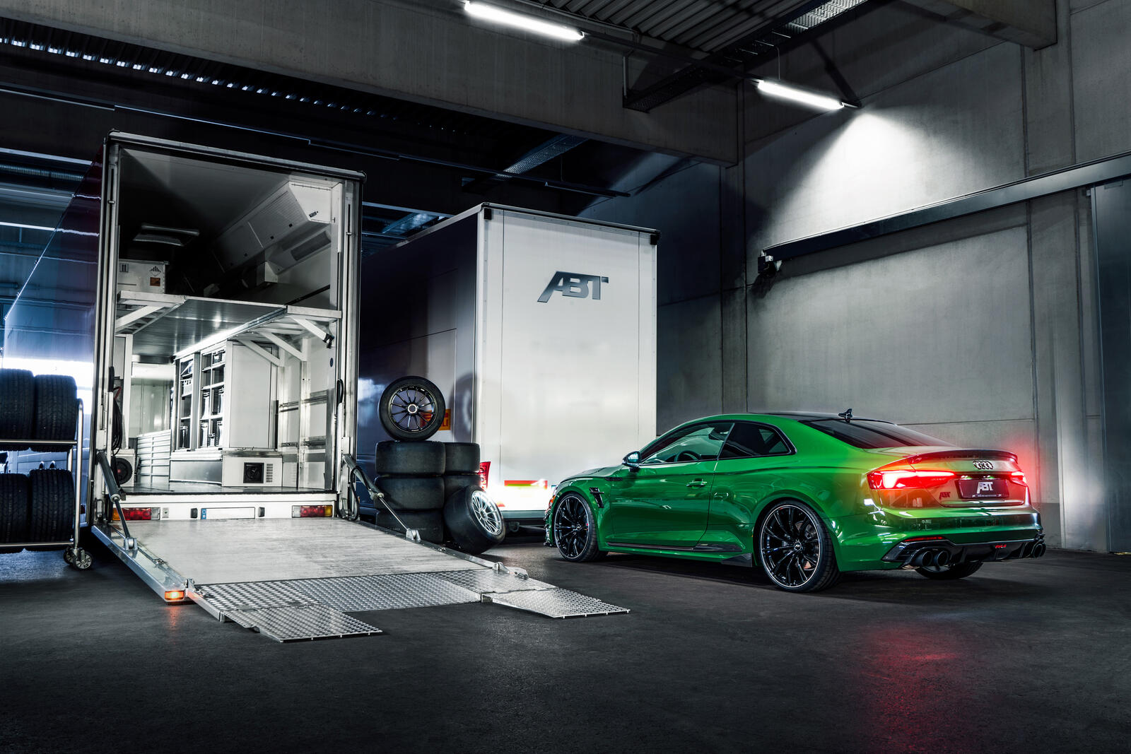 Free photo Green Audi Abt Rs5 R at the tire shop.