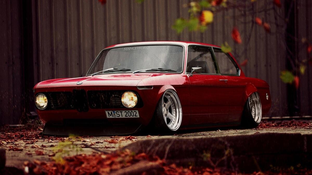 An old bmw in red on the stanza